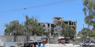 A rickshaw is seen near the scene of a suicide explosion after al-Shabaab militia stormed a government building in Mogadishu, Somalia March 23, 2019. REUTERS/Feisal Omar