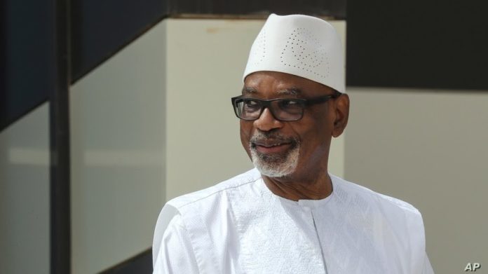 FILE - Mali President Ibrahim Boubacar Keita poses for a group picture during the G5 Sahel summit in Nouakchott, June 30, 2020.