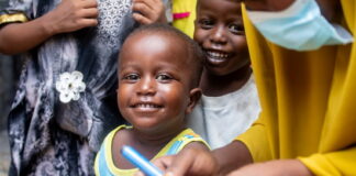 A young child is to be vaccinated as part of national polio vaccination campaign in Mogadishu, Somalia on Wednesday 28 October 2020. WHO Somalia is running the second round of their polio Campaign. Photo: Siyaad Mohamed /Ildoog/ WHO SOMALIA