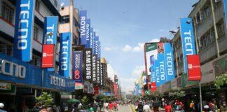 People go about their businesses along Luthuli Avenue in Nairobi, capital of Kenya, Oct. 15, 2020. (Xinhua/Charles Onyango)