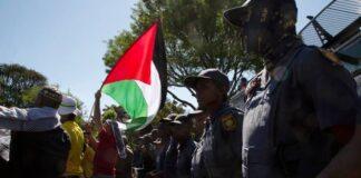 AP Pro-Palestinian supporters demonstrate at the entrance to the Israeli embassy in Pretoria, South Africa. / Photo: AP