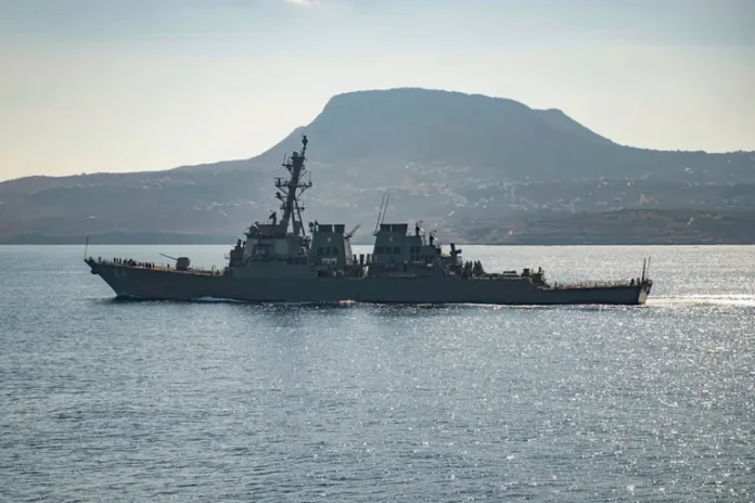 The guided-missile destroyer USS Carney in Souda Bay, Greece. The US warship and multiple commercial ships came under attack Sunday, December 3, 2023, in the Red Sea [Petty Officer 3rd Class Bill Dodge/US Navy via AP]