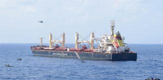 Boats maneuver around the pirated commercial ship MV Ruen during an Indian military operation on Saturday. Ministry of Defence/PIB via CNN